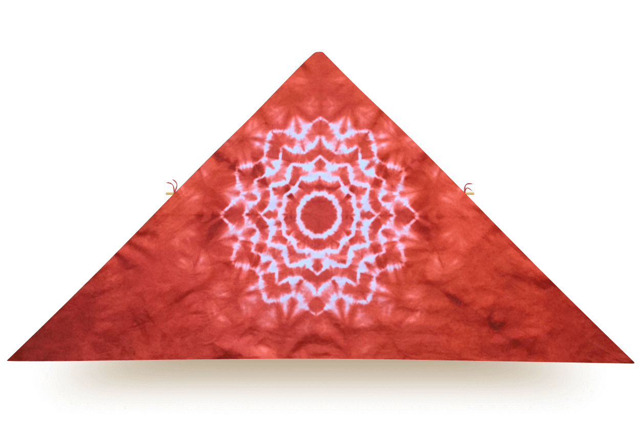 Red delta kite with white mandala pattern, made of organic cotton and Canadian hardwood frame