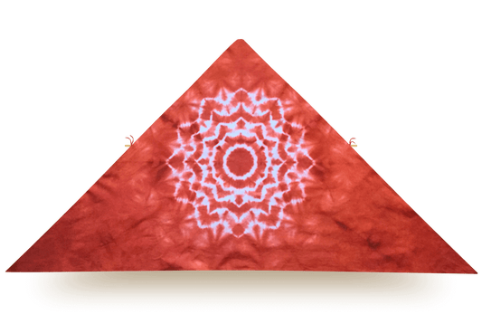 Red delta kite with white mandala pattern, made of organic cotton and Canadian hardwood frame