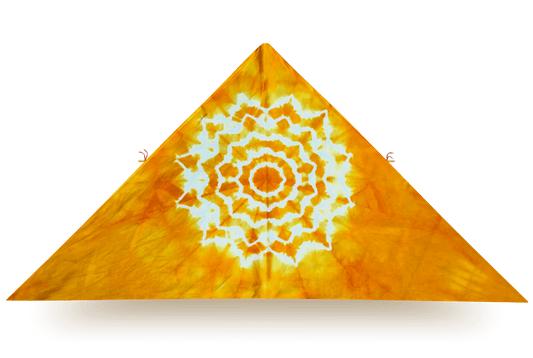 Bright orange delta kite with white tie-dye mandala pattern, crafted from organic cotton with a hardwood frame