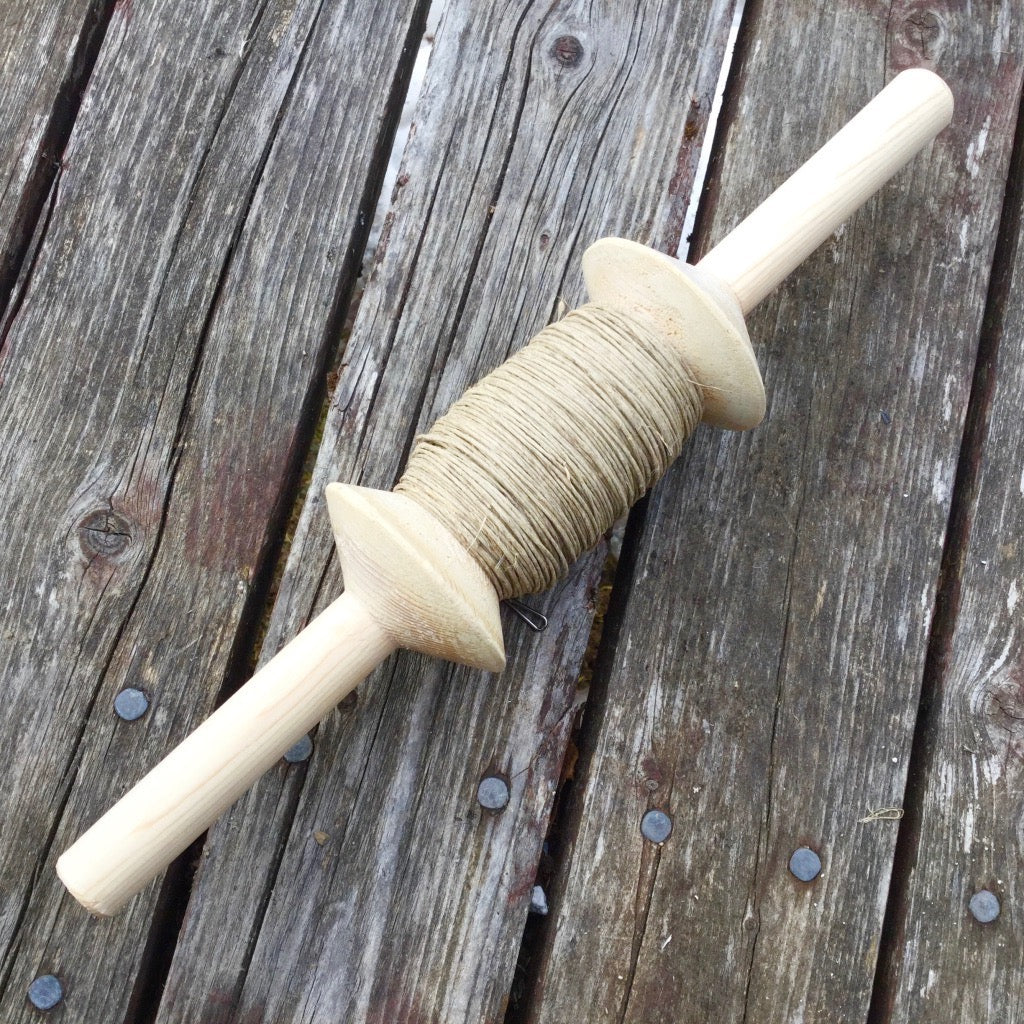 250 feet of 6-ply hemp kite string wound on a yellow birch wooden spool