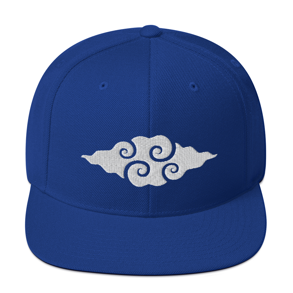 Blue baseball cap featuring the Little Cloud Kites swirl logo embroidered in white on the front